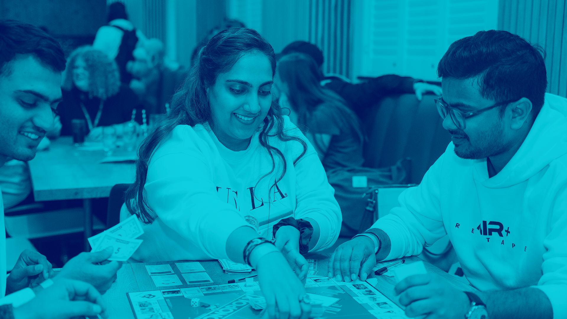 students playing a board game
