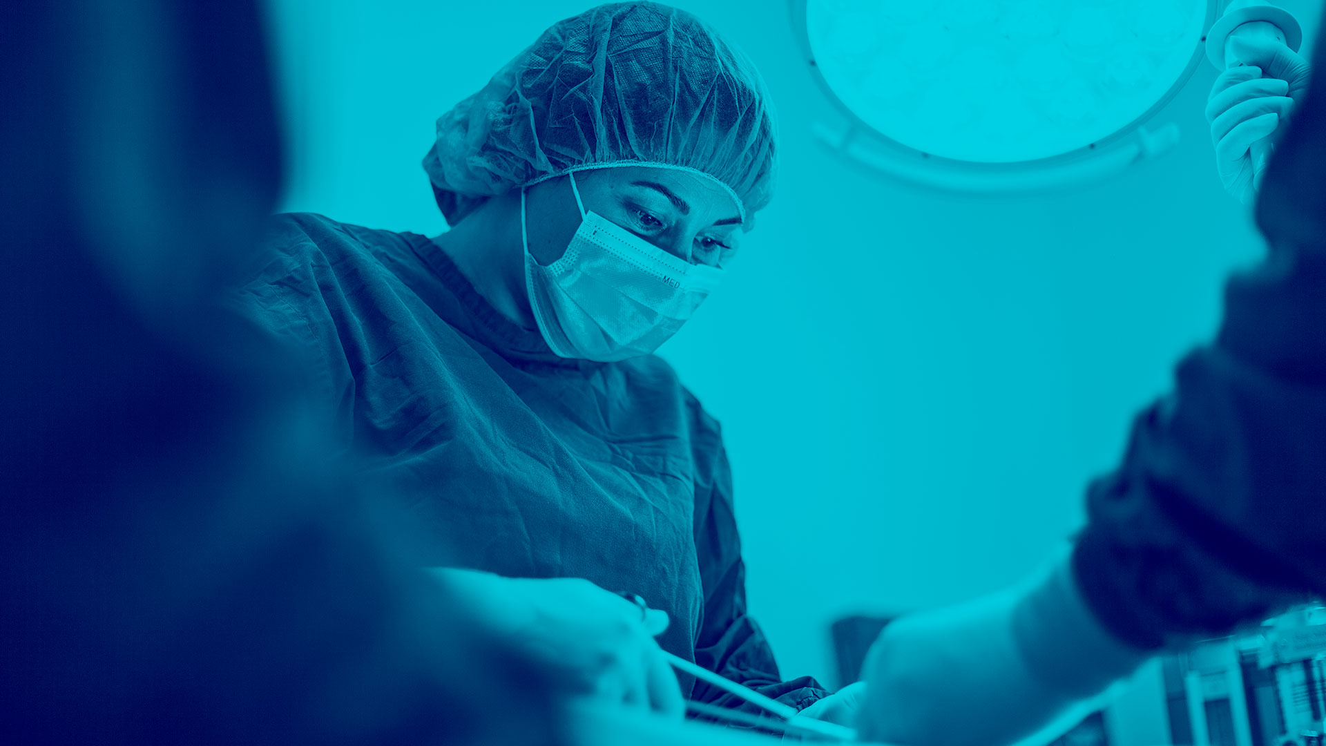 A nurse focusing on a patient