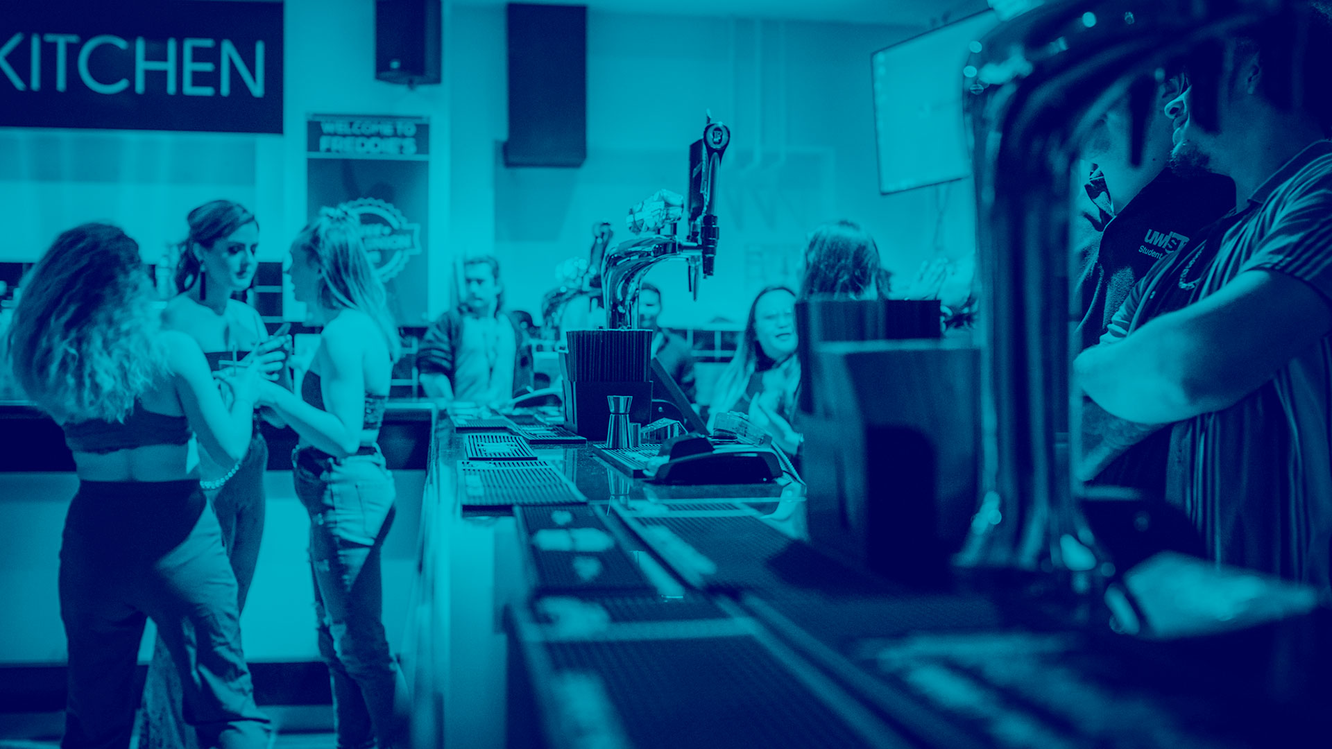 Staff working in Freddie's Bar